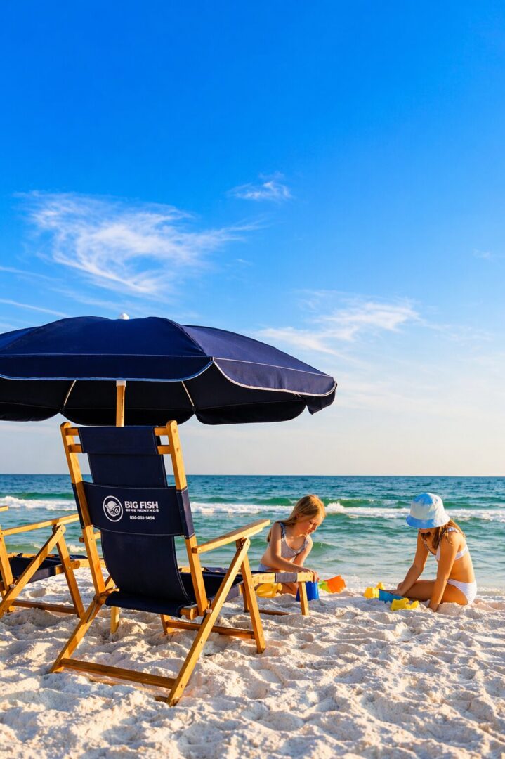 Beach umbrella shading two children building sandcastles